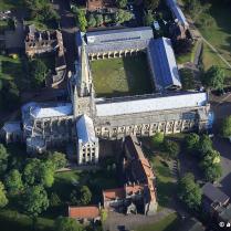 aerial photograph of Norwich Cathedral , Norfolk, England UK. Construction of Norwich Cathedral lasted 49 years from 1145 to 1145. Since then the Spire has been partially rebuilt in medieval times but the building is largely unchanged from the last renovation in 1480.The 315 ft spire is the second tallest in England